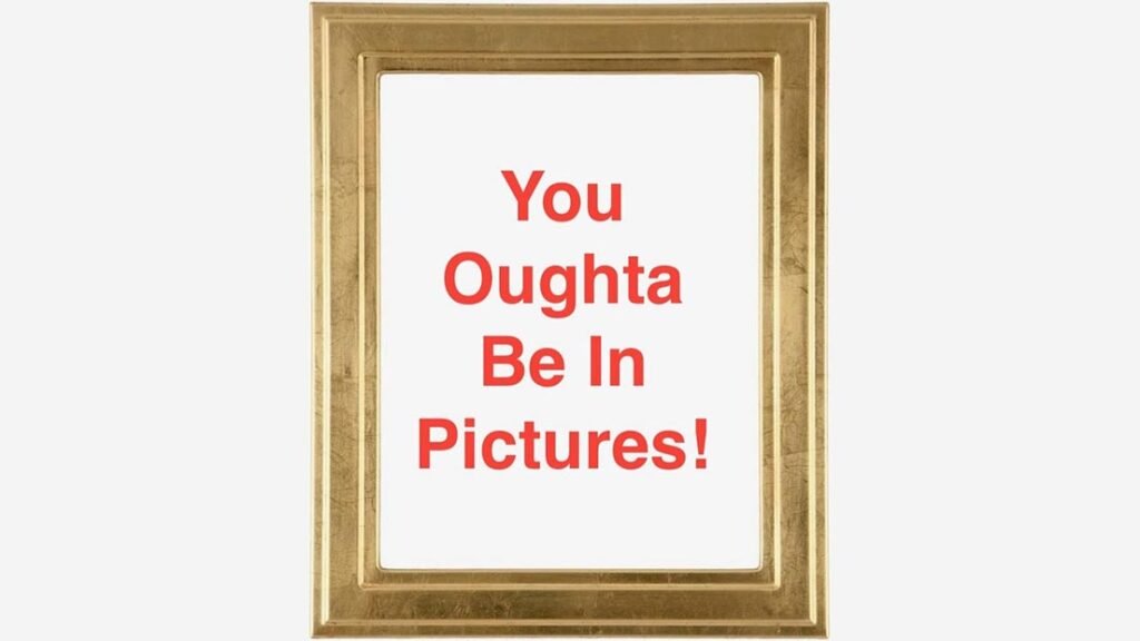 Picture frame with message "You Oughta be in Pictures"